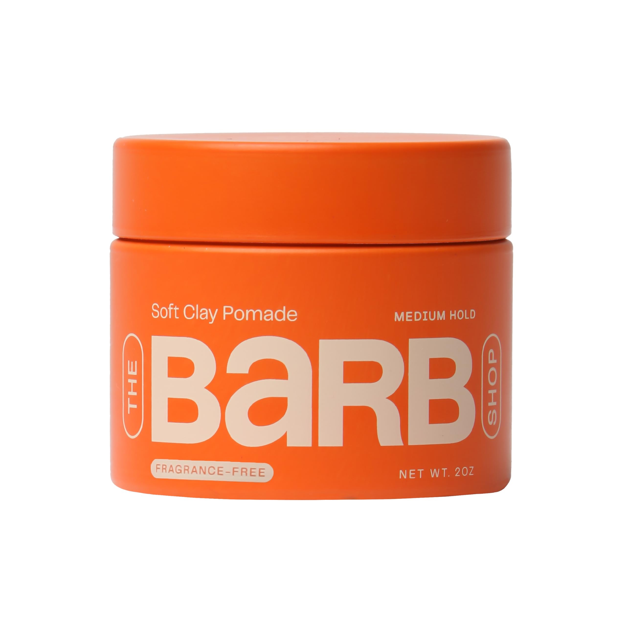 The Barb Shop Barb Soft Clay Pomade bottle close-up shows fragrance-free, water-based hold.
