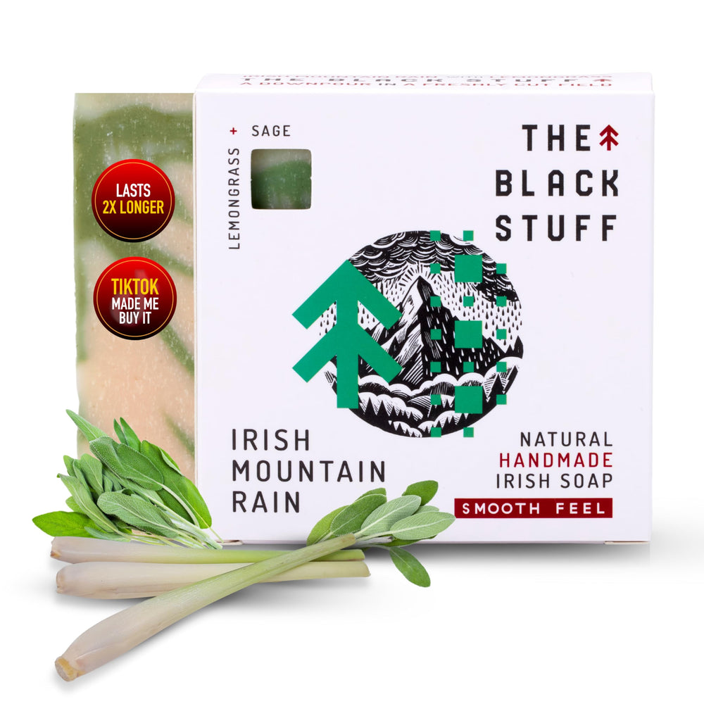 The Black Stuff bar soap close-up highlights a rich, cleansing lather for daily use.