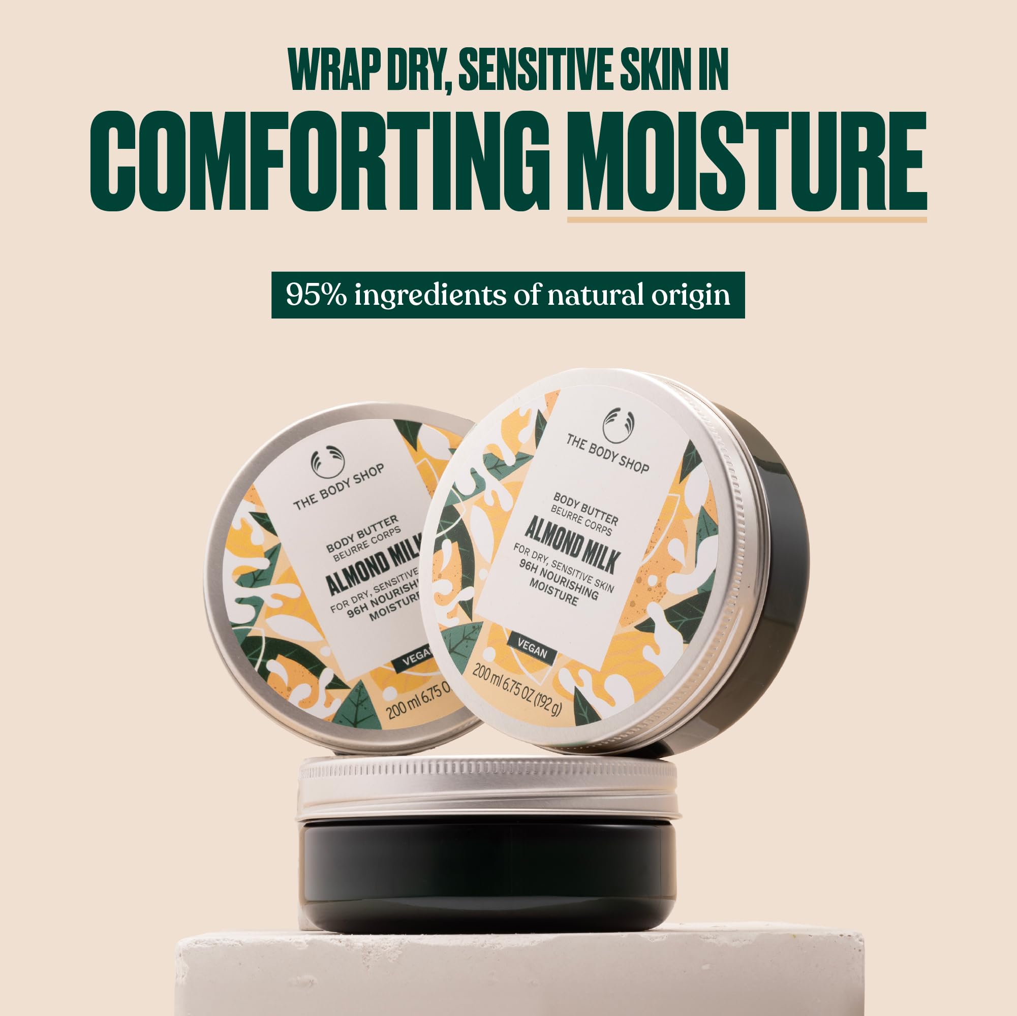 The Body Shop Almond Milk Body Butter texture close-up highlights creamy, non-greasy feel