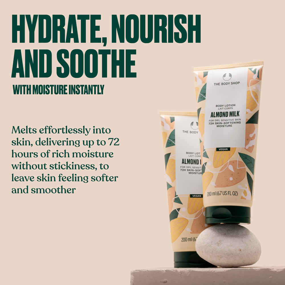 The Body Shop Almond Milk and Honey lotion being applied to skin for soothing hydration.
