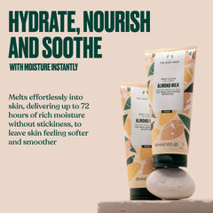 The Body Shop Almond Milk and Honey lotion being applied to skin for soothing hydration.
