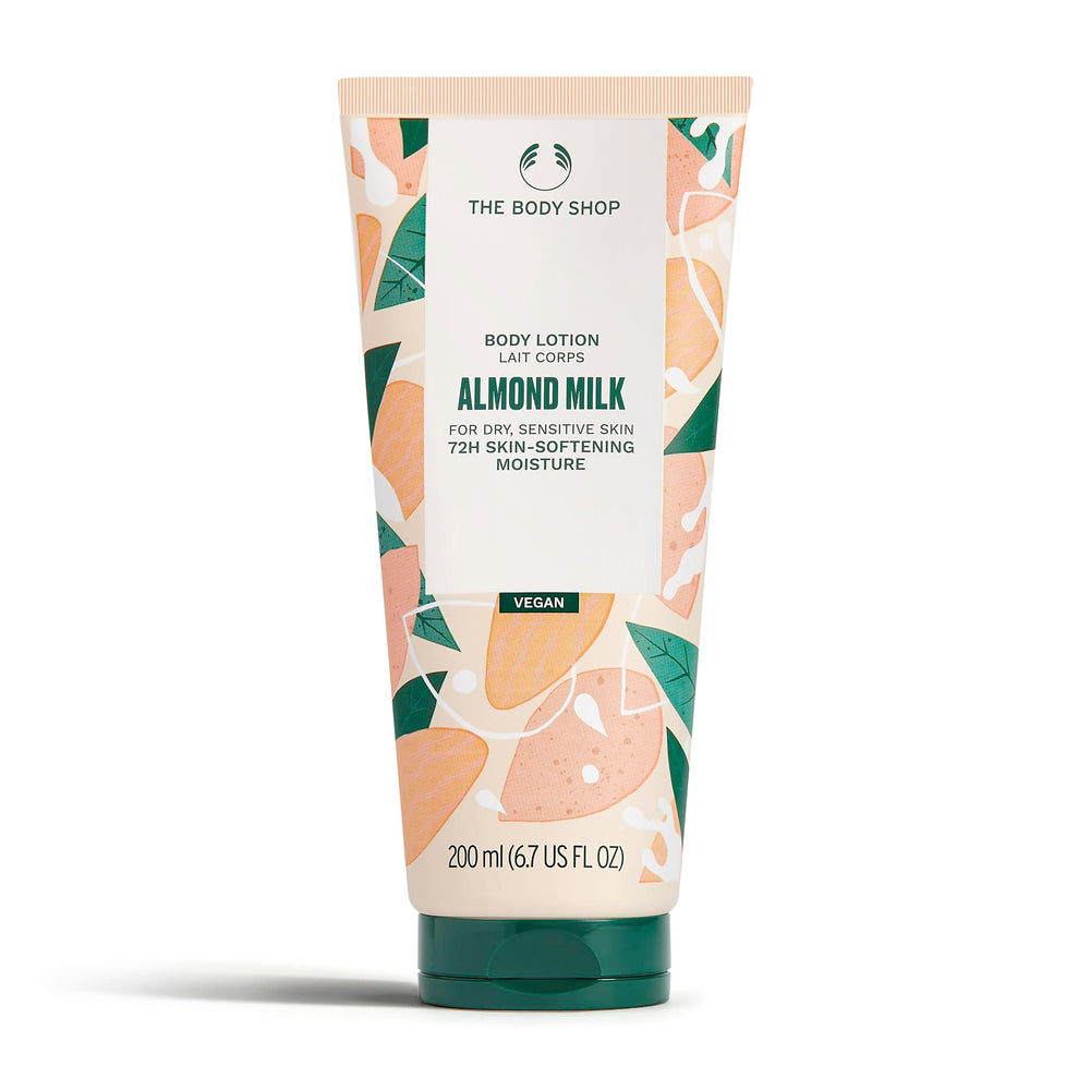 The Body Shop Almond Milk and Honey lotion tube close-up for lightweight, hydrating moisture.