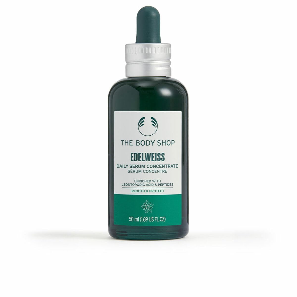 The Body Shop Edelweiss serum bottle close-up for radiant hydration.