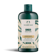 The Body Shop Ginger Scalp Care Conditioner bottle front, signaling nourishing scalp benefits.