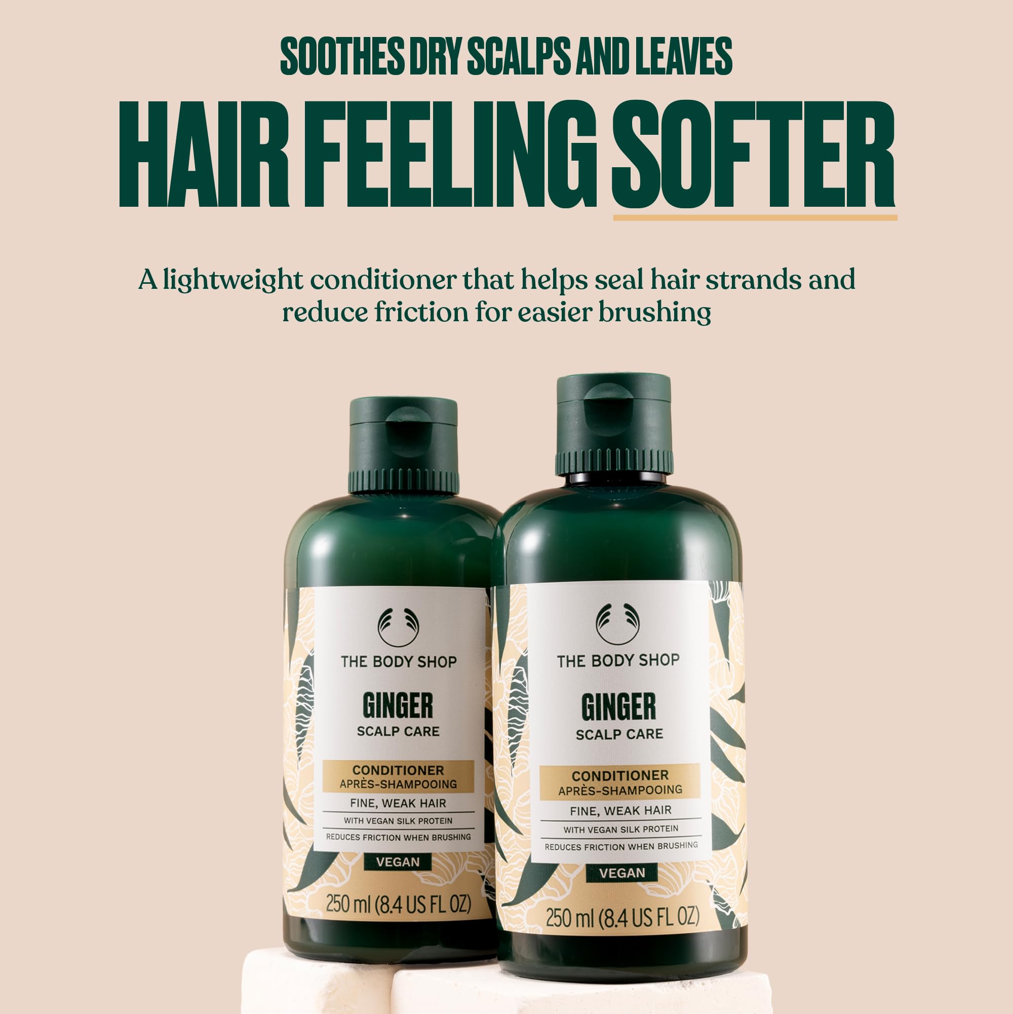 The Body Shop Ginger Scalp Care Conditioner label closeup showing natural ingredients and community trade aloe.
