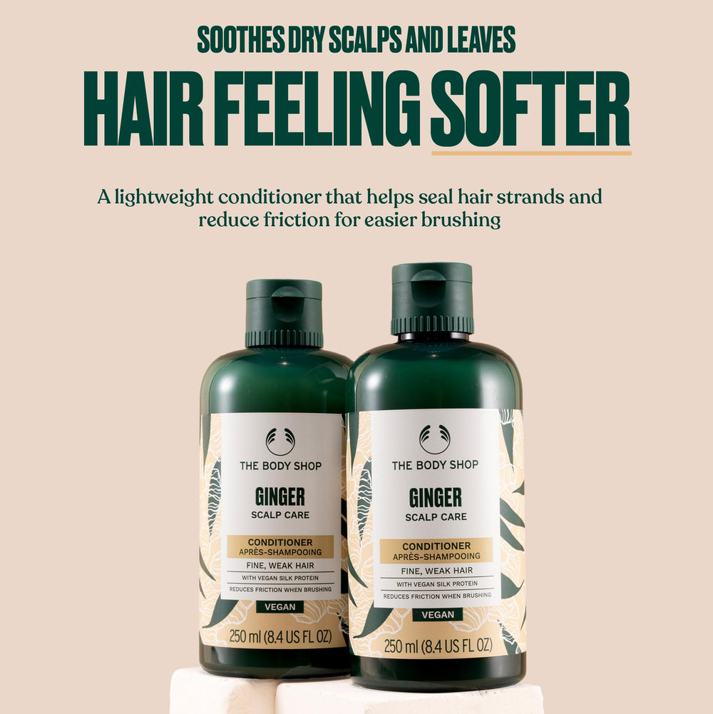 The Body Shop Ginger Scalp Care Conditioner label closeup showing natural ingredients and community trade aloe.