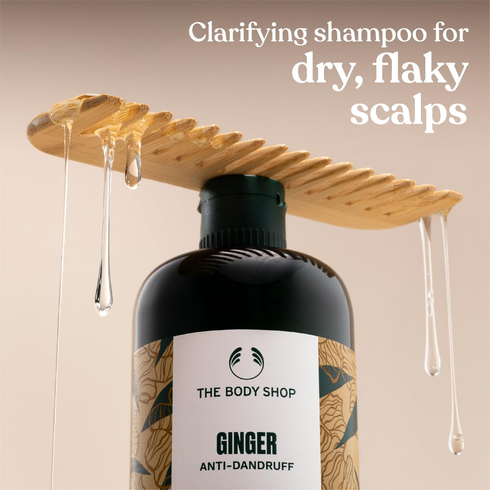 The Body Shop Ginger Scalp Care Shampoo lather on scalp during cleansing.