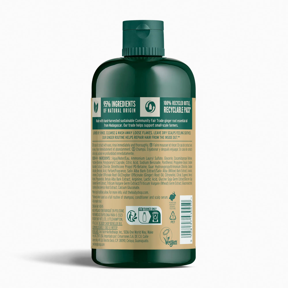 The Body Shop Ginger Scalp Care Shampoo lather highlights gentle cleansing for flaky scalp.