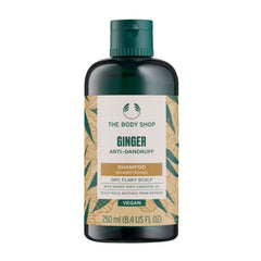 The Body Shop Ginger Scalp Care Shampoo pour bottle shows a refreshing cleanse for dry scalp relief.