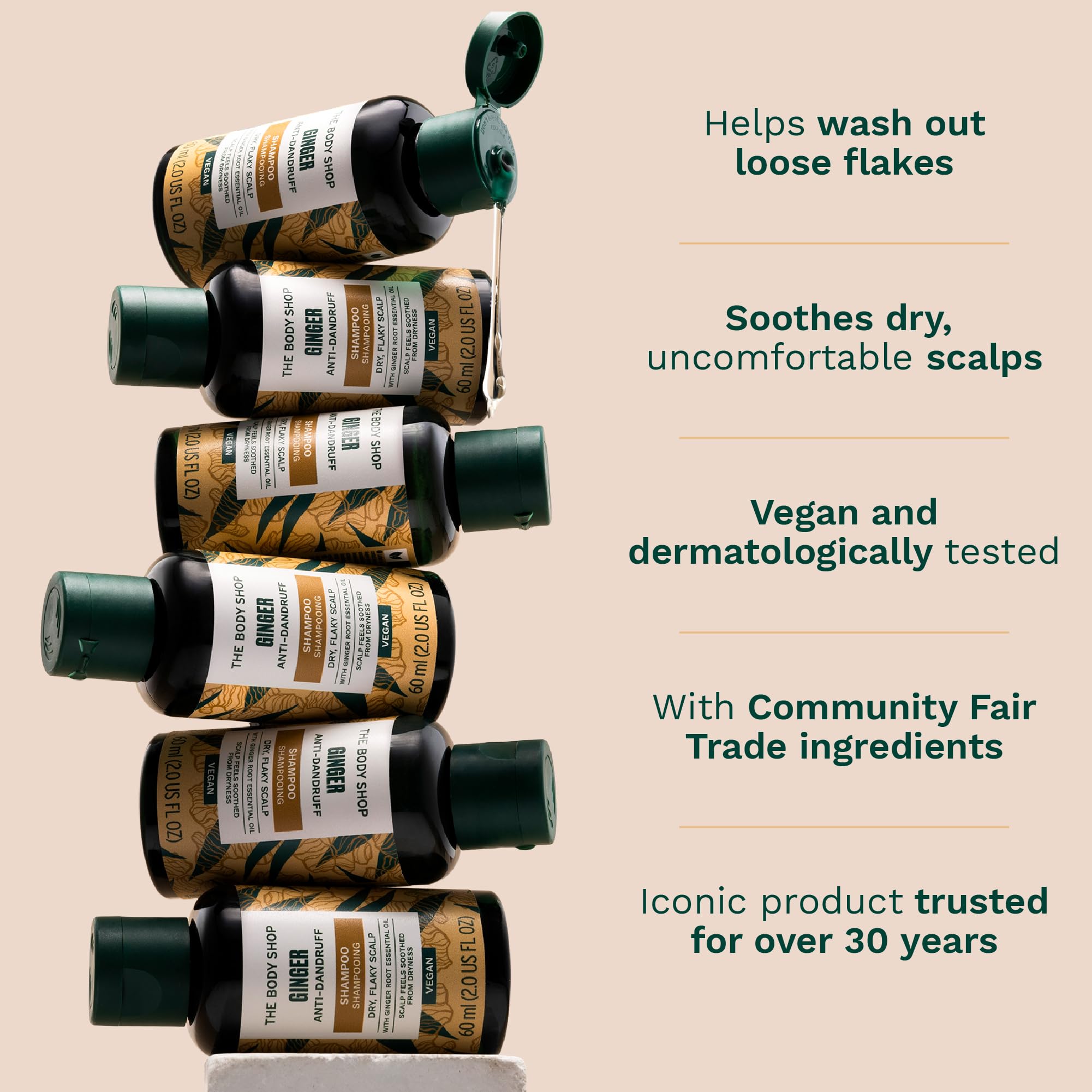 The Body Shop Ginger Scalp Care Shampoo vegan silk-protein closeup communicates nourished hair.