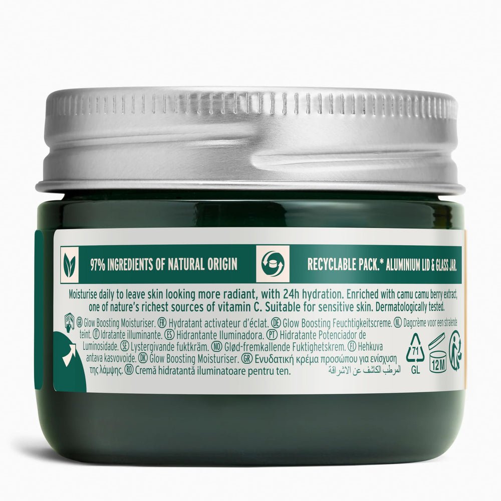 The Body Shop Glow Boost Moisturizer texture close-up shows creamy smoothing formula.