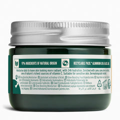 The Body Shop Glow Boost Moisturizer texture close-up shows creamy smoothing formula.