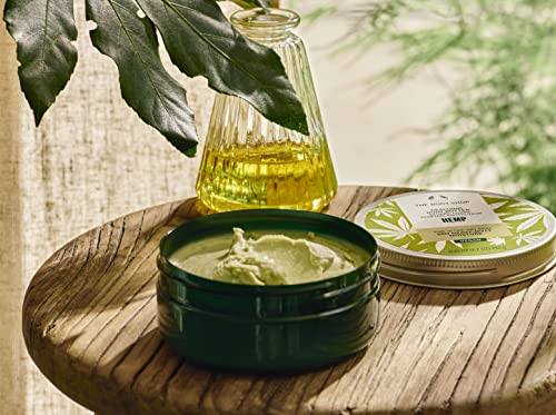 The Body Shop hemp butter jar close-up highlights Ghana-sourced shea butter for soft, soothed skin.
