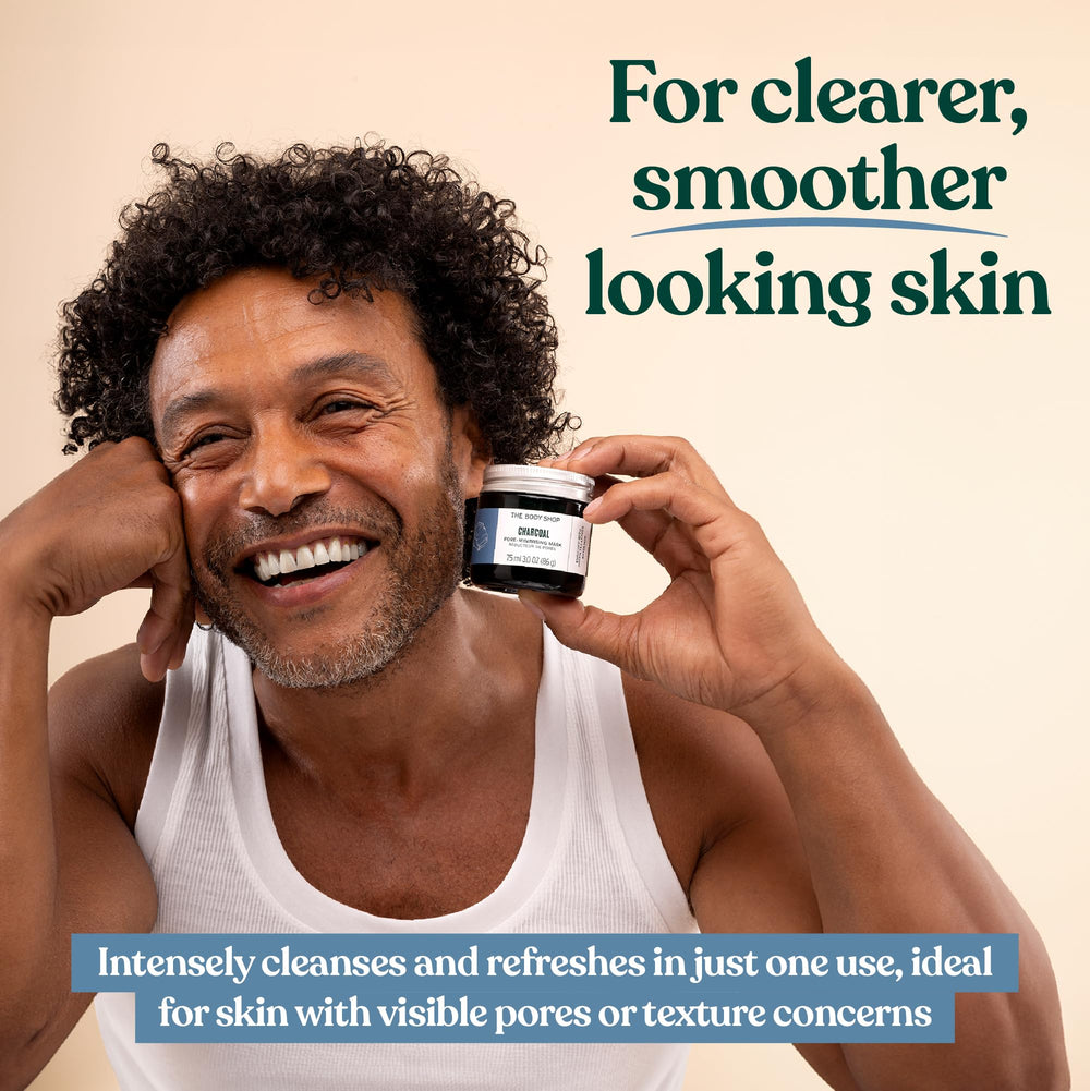 The Body Shop Himalayan Charcoal Purifying Glow Mask being applied for a refreshing cleanse