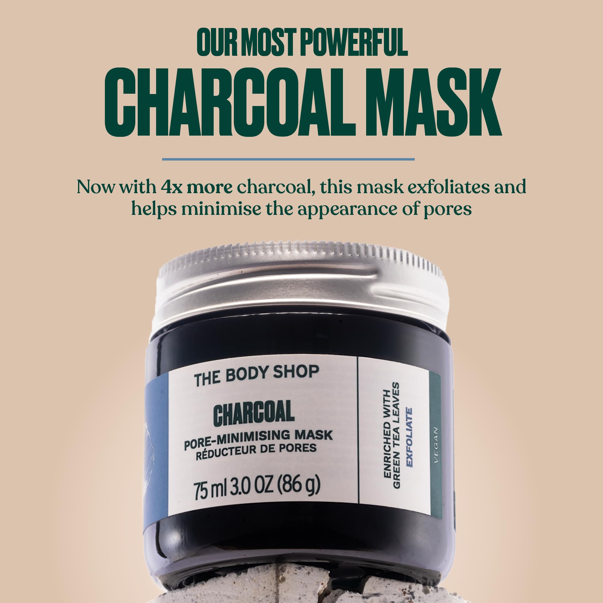 The Body Shop Himalayan Charcoal Purifying Glow Mask tea tree oil drop offers calming aroma