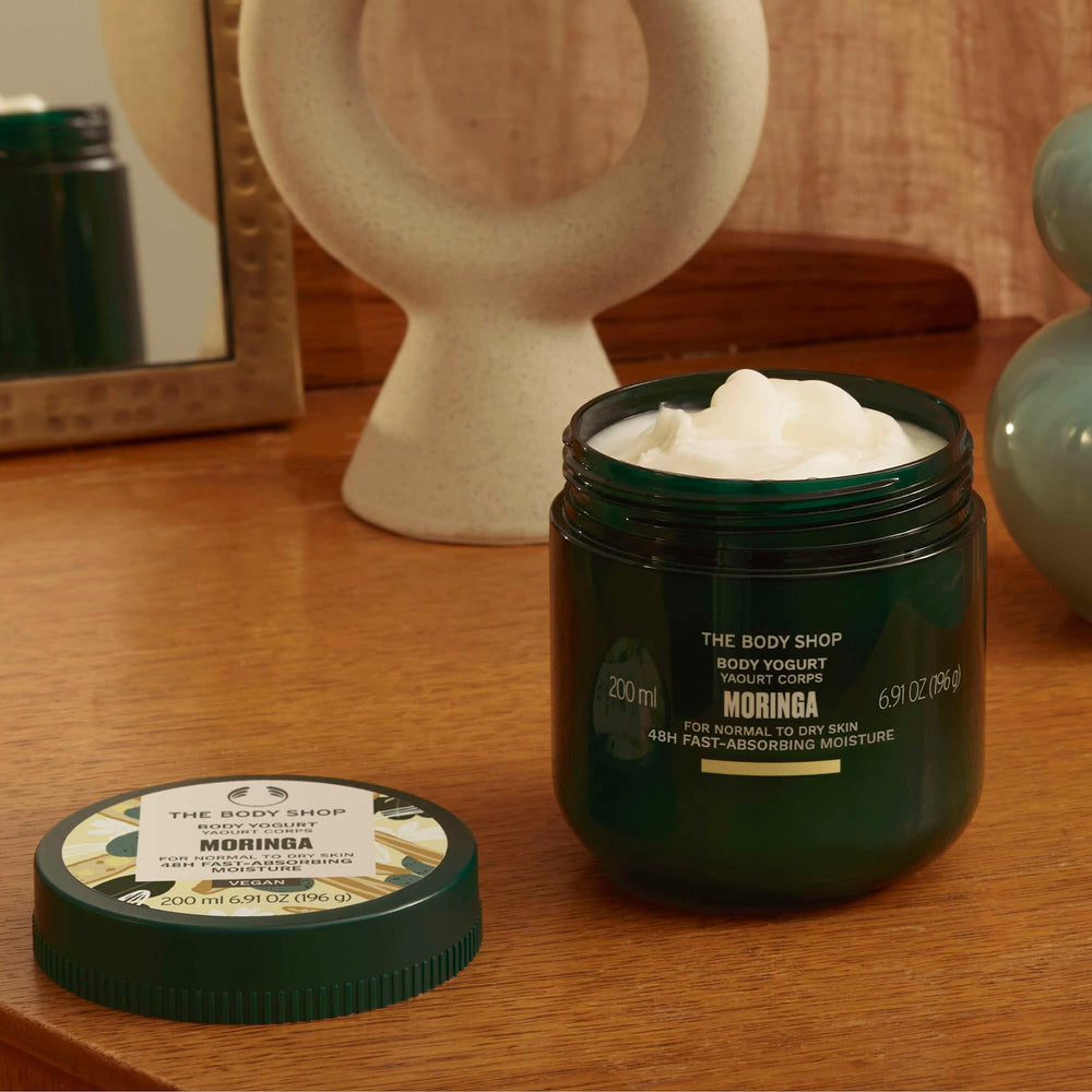 The Body Shop Moringa Body Yogurt on damp skin demonstrates instant absorption after shower.