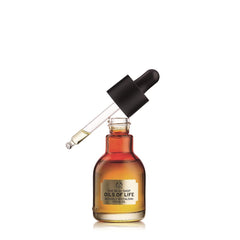 The Body Shop Oils of Life bottle closeup—lightweight hydration for dry skin.