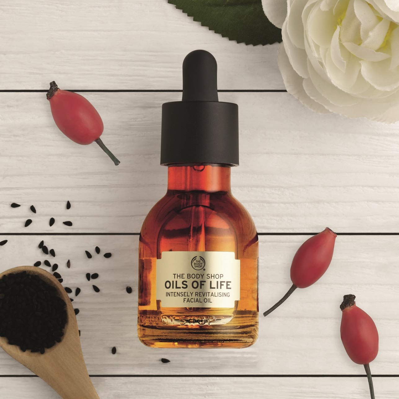 The Body Shop Oils of Life massaged into neck—velvety-soft feel.