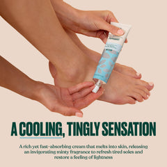 Hands applying The Body Shop Peppermint Invigorating Foot Cream on feet