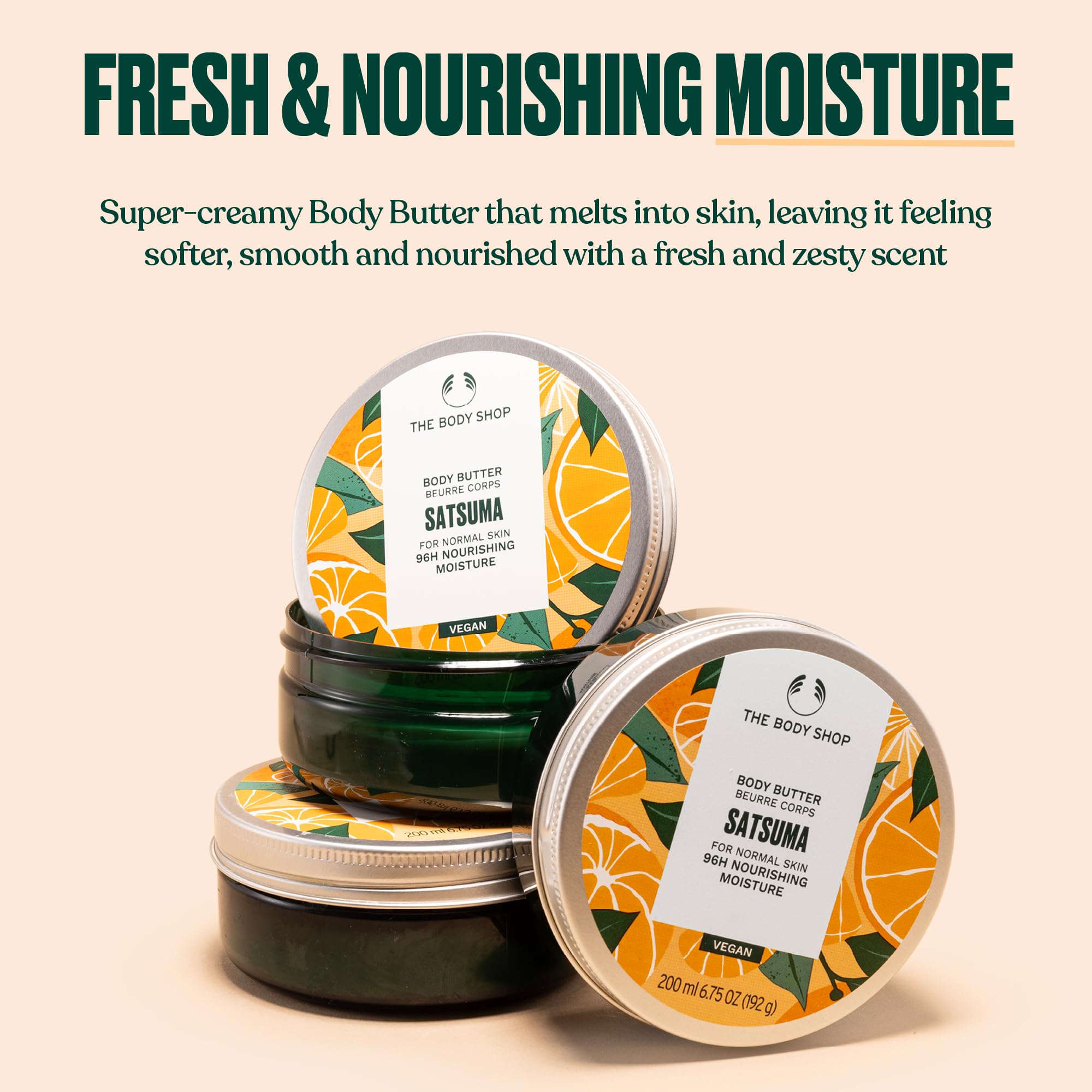 The Body Shop Satsuma Body Butter texture close-up highlights rich, non-greasy cream.