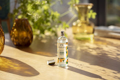 The Body Shop Satsuma Body Mist glass bottle highlighting sustainable design and vibrant scent