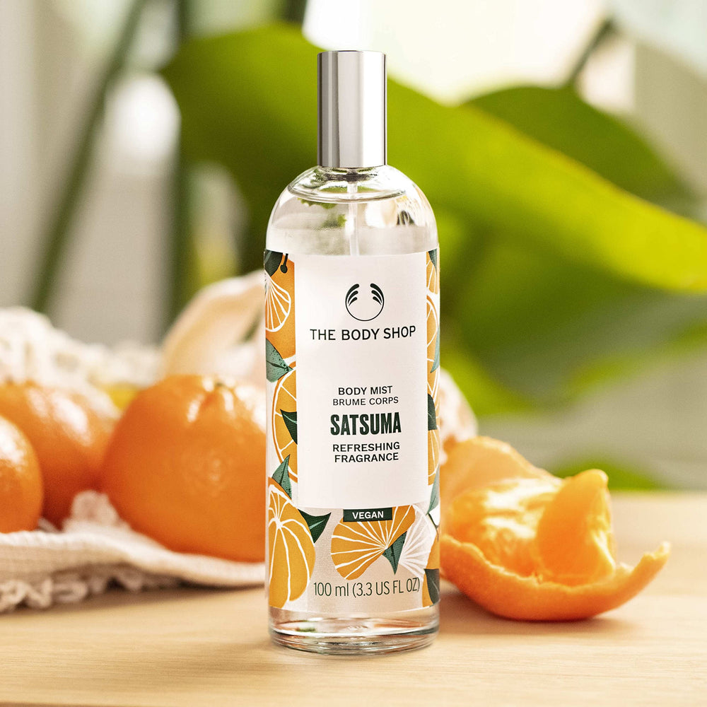 The Body Shop Satsuma Body Mist spritz application showing quick citrus refresh