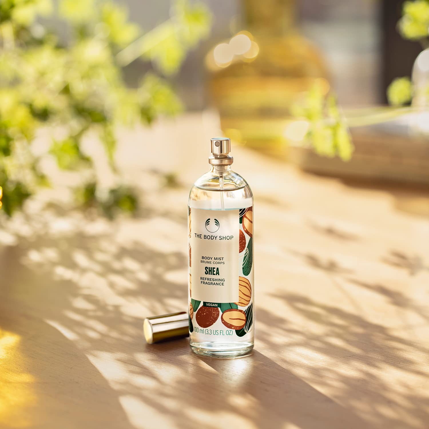 The Body Shop Shea Body Mist packaging uses recyclable glass for planet-friendly choices.