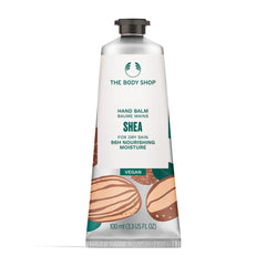 The Body Shop Shea Hand Balm application closeup showing quick-absorb gel-cream for dry hands