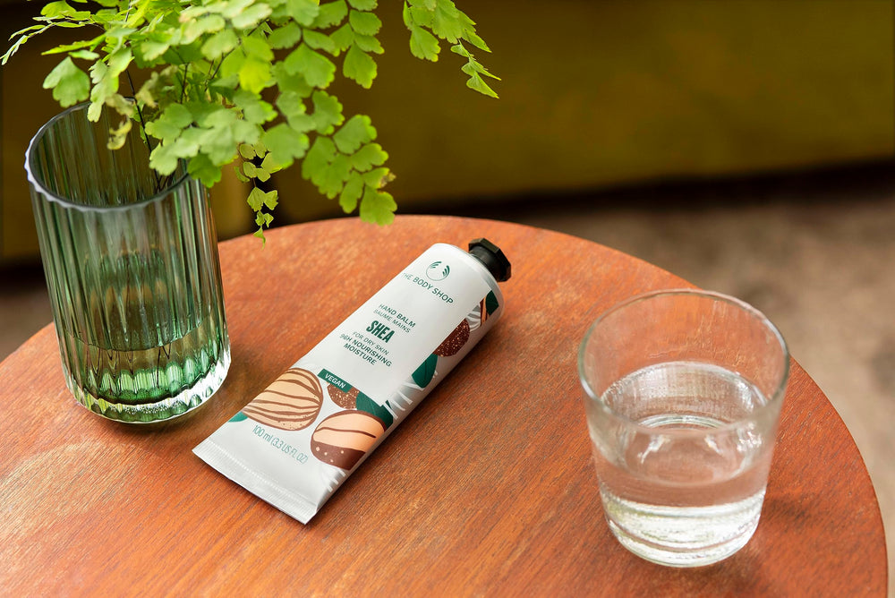 The Body Shop Shea Hand Balm packaging label highlights vegan, nourishing formula