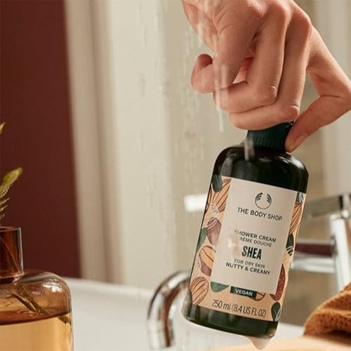 The Body Shop Shea Shower Cream texture reveals a creamy, foamy lather ideal for comfort