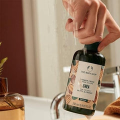 The Body Shop Shea Shower Cream texture reveals a creamy, foamy lather ideal for comfort