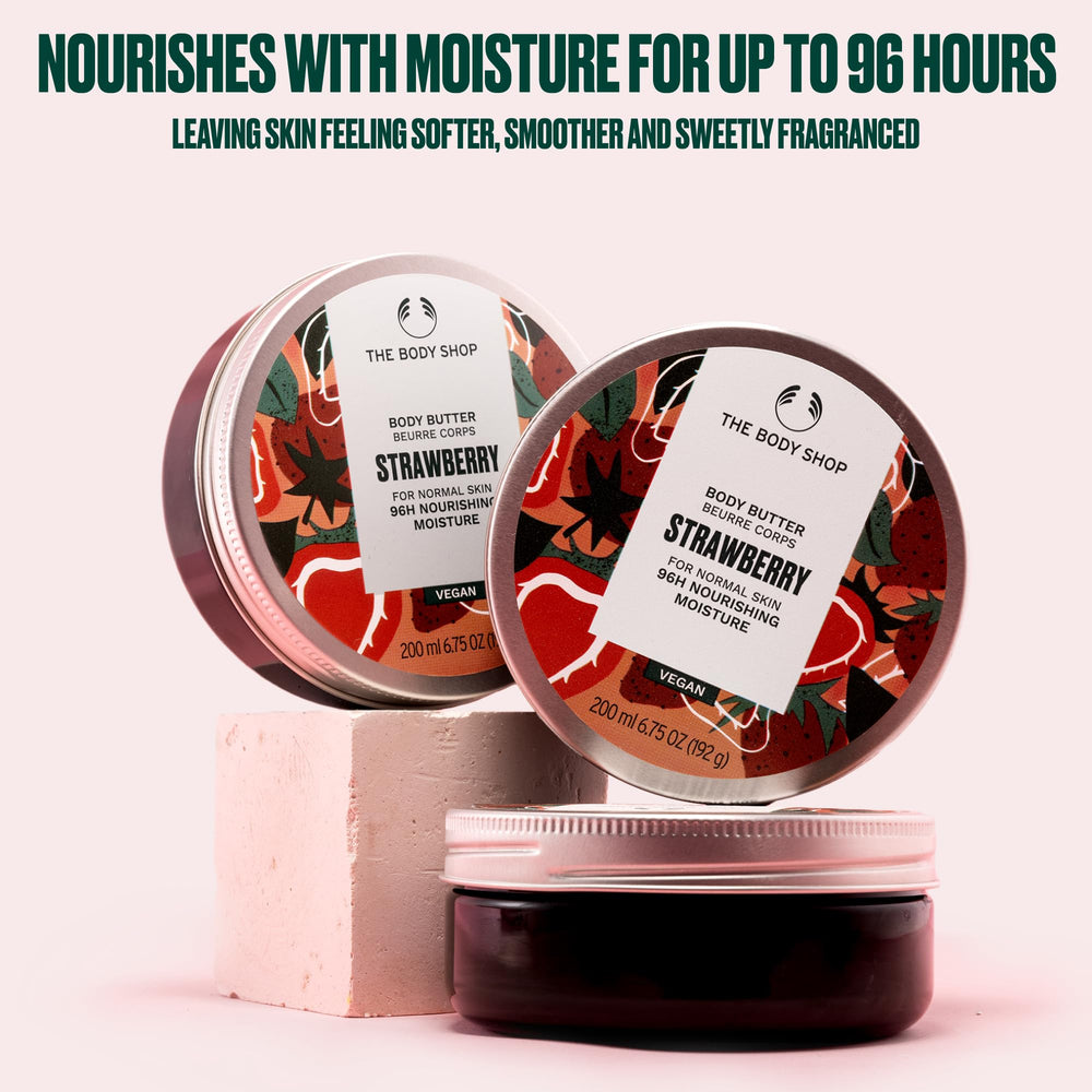 The Body Shop Strawberry Body Butter jar closeup highlighting creamy, non-greasy finish.