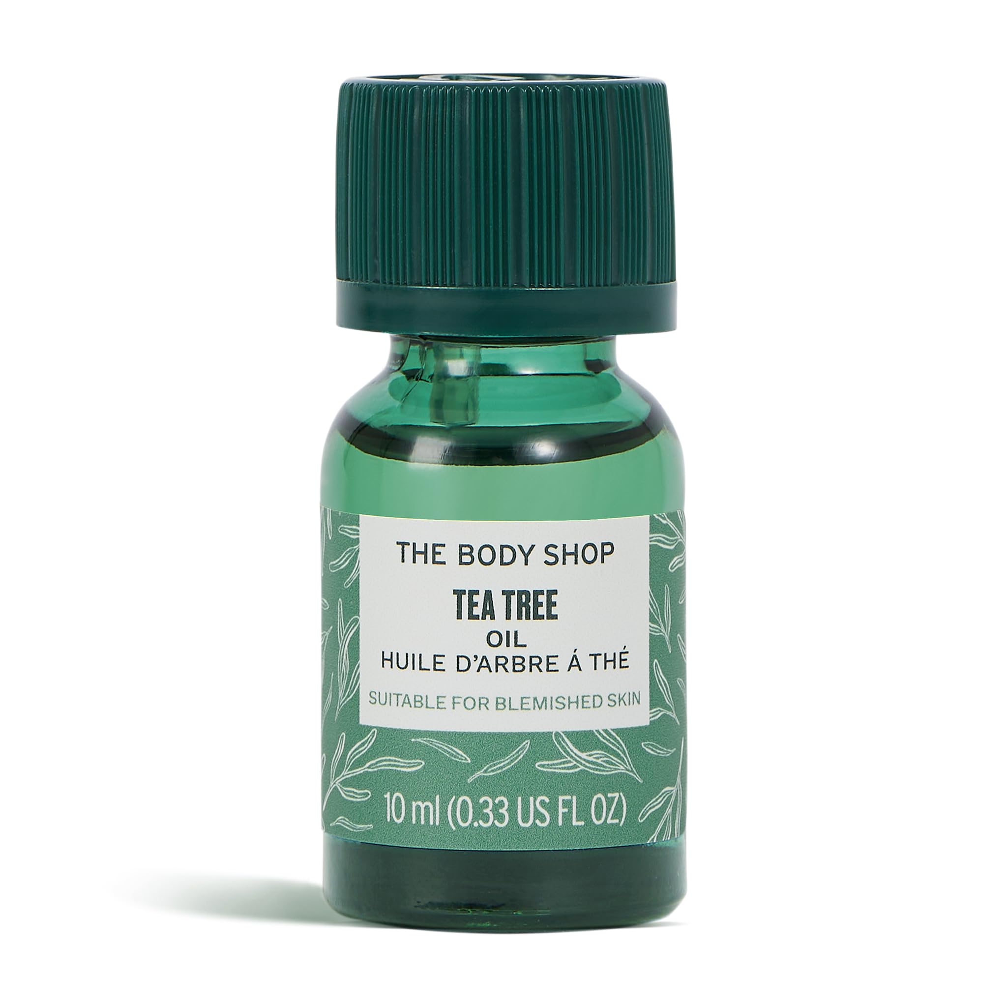The Body Shop Tea Tree Oil bottle closeup showing purifying care for oily skin.