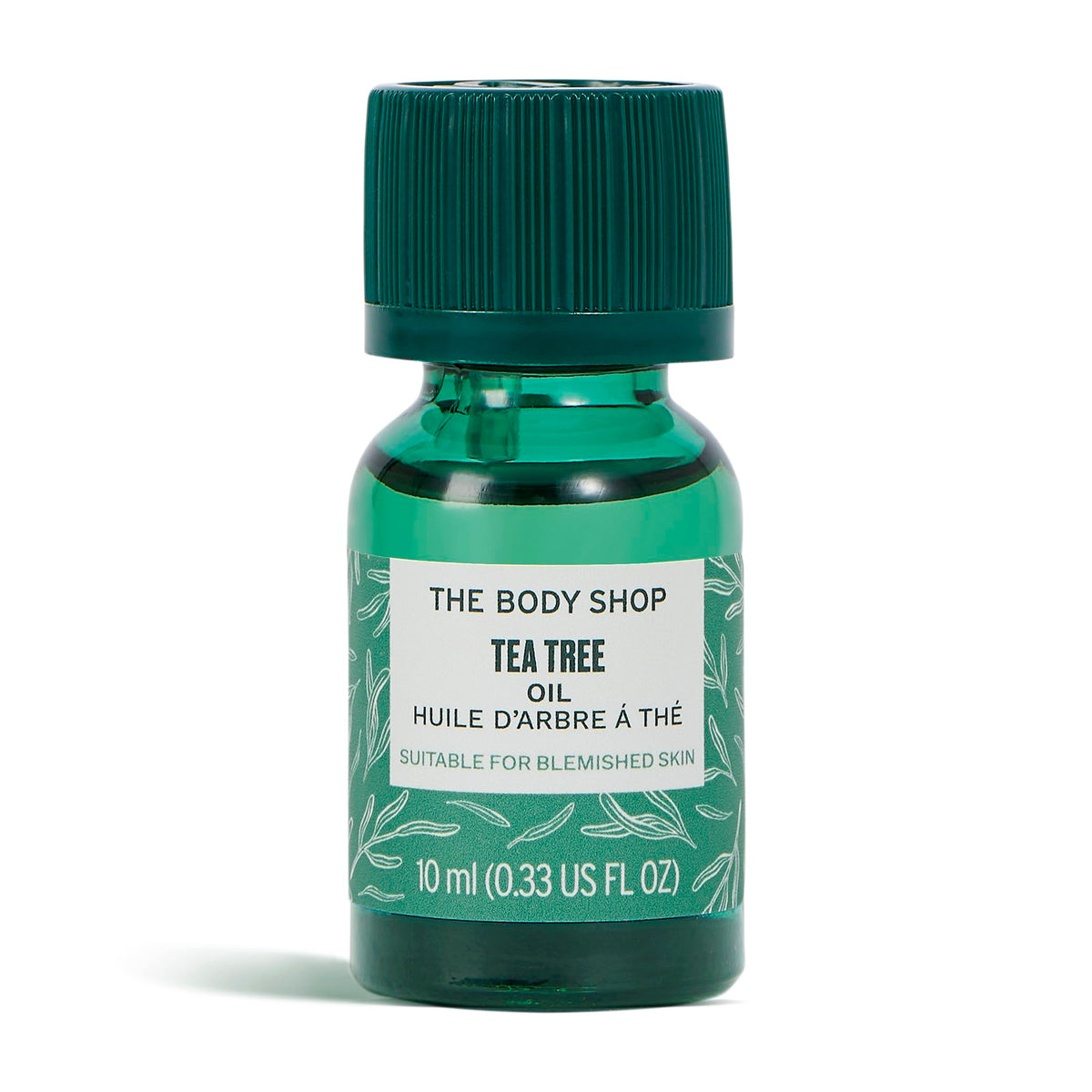 The Body Shop Tea Tree Oil bottle closeup showing purifying care for oily skin.