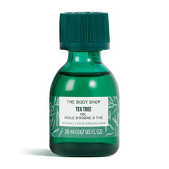 The Body Shop Tea Tree Oil bottle close-up illustrating purifying action for blemish-prone skin