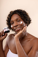 The Body Shop Vitamin E Intense Moisturizer texture application demonstrates quick absorption