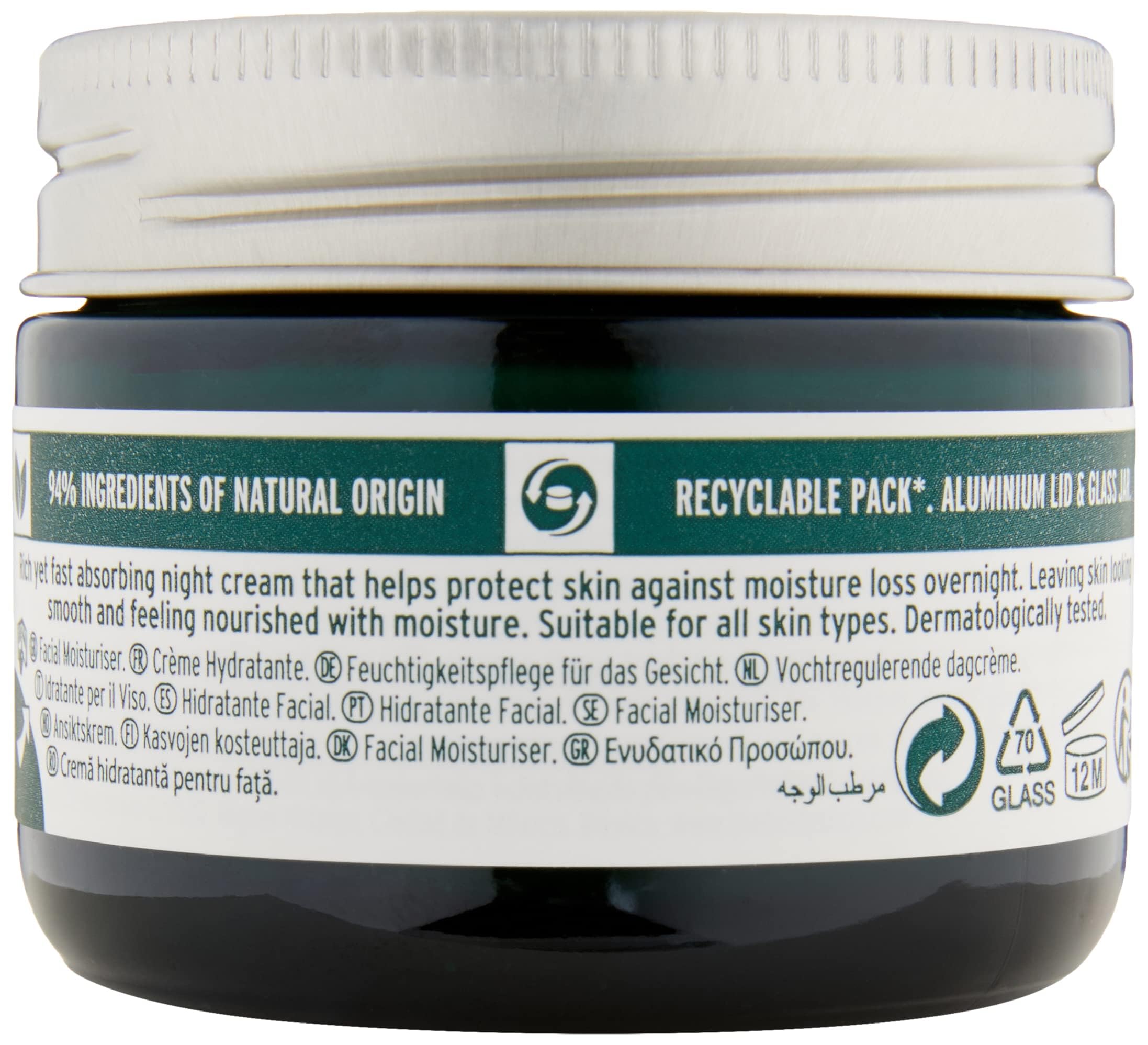 The Body Shop Vitamin E Night Cream being smoothed on skin during routine.