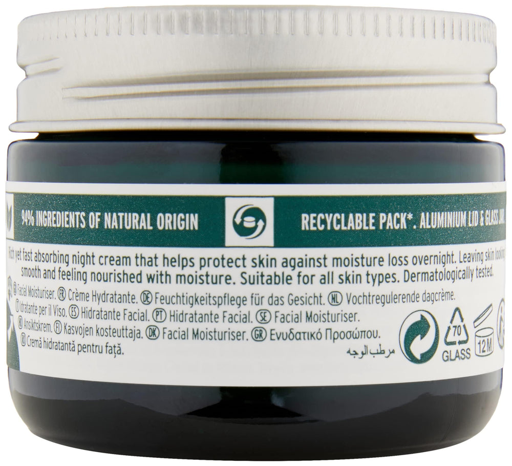 The Body Shop Vitamin E Night Cream being smoothed on skin during routine.