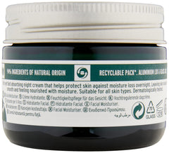 The Body Shop Vitamin E Night Cream being smoothed on skin during routine.