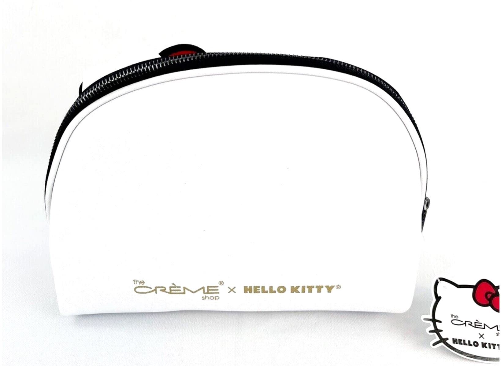 The Crème Shop Hello Kitty dome pouch with zipper, easy access during travel.