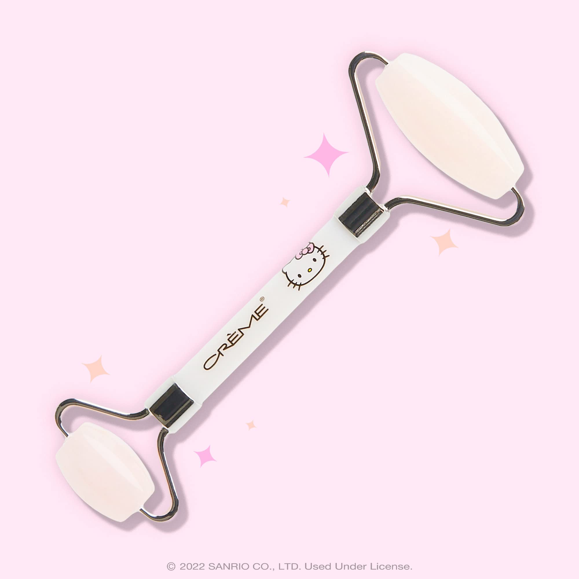 The Crème Shop Hello Kitty Love Quartz Roller — small end for eyes, helps reduce puffiness with serums.
