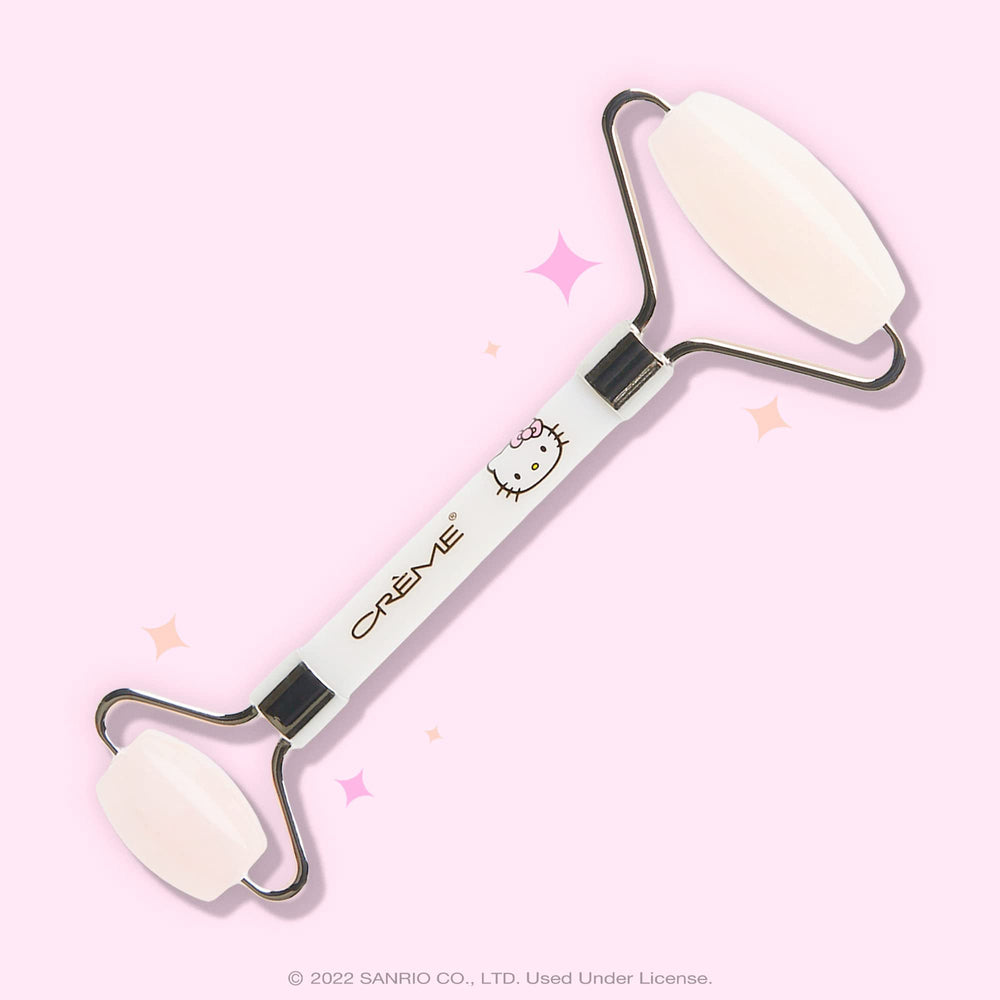 The Crème Shop Hello Kitty Love Quartz Roller — small end for eyes, helps reduce puffiness with serums.