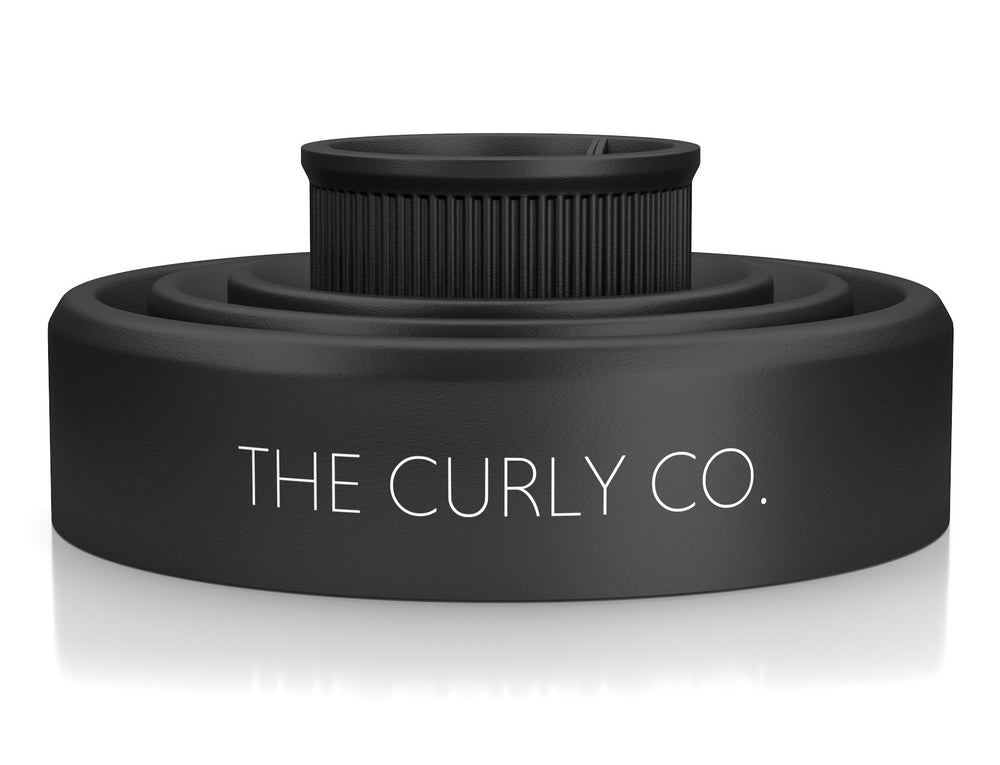 The Curly Co collapsible hair diffuser in diffusing action provides gentle airflow for defined texture.