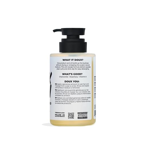 The Doux Breakdown clarifying lather removes buildup while preserving curl texture and moisture.