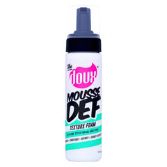 The Doux Mousse bottle shows flexible hold for soft, defined curls.
