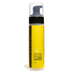 The Hair Diagram Ashley Marie Styling Mousse bottle demonstrates frizz control and lightweight hold.