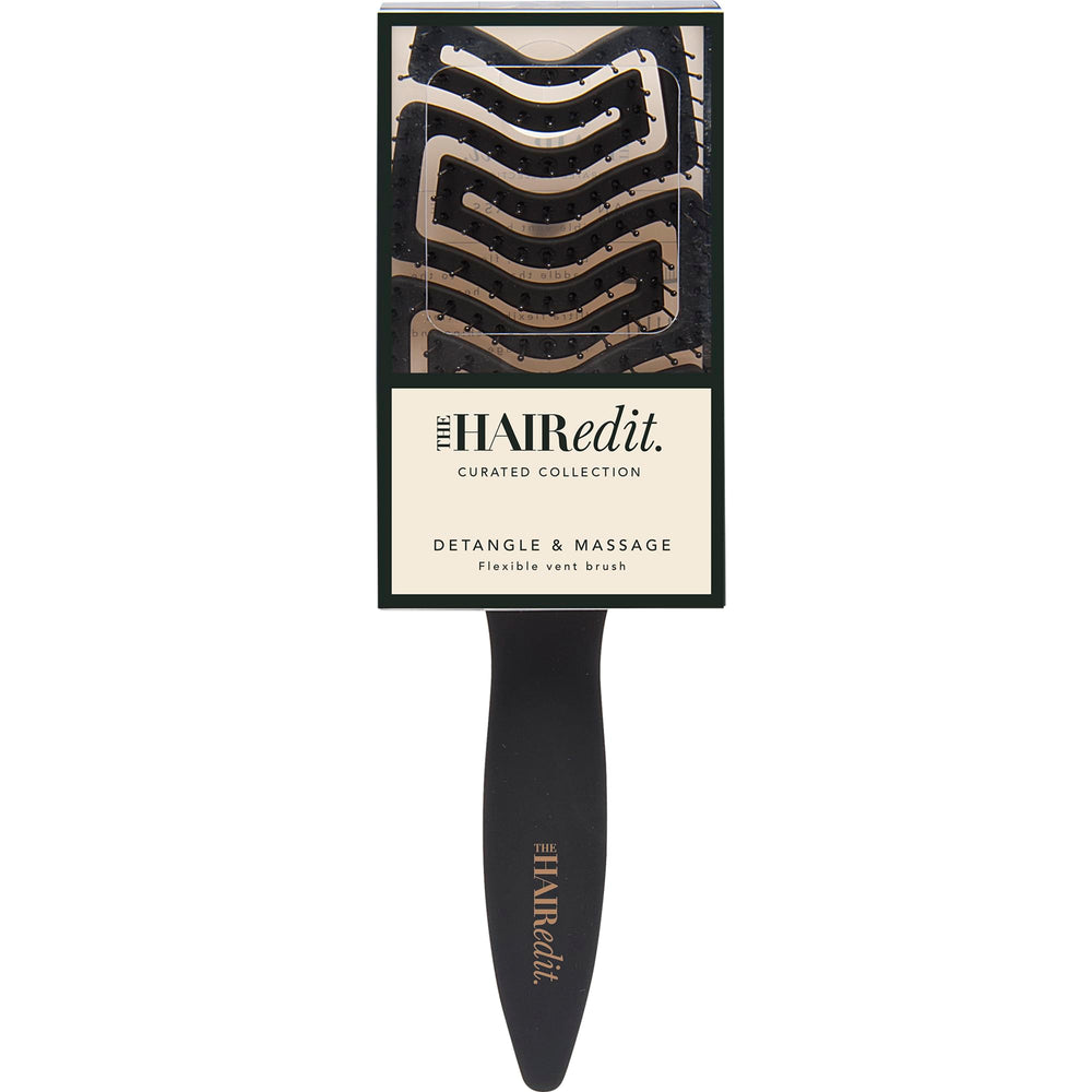 The Hair Edit curved paddle massage guides gentle strokes for daily scalp care.