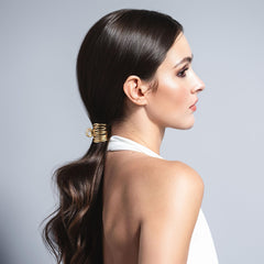 The Hair Edit gilded wrap ponytail cuff clip open claw demonstrates easy gripping without snagging.