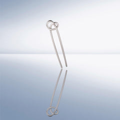 The Hair Edit knotted chignon pin packaging highlights accessory that complements professional and casual looks
