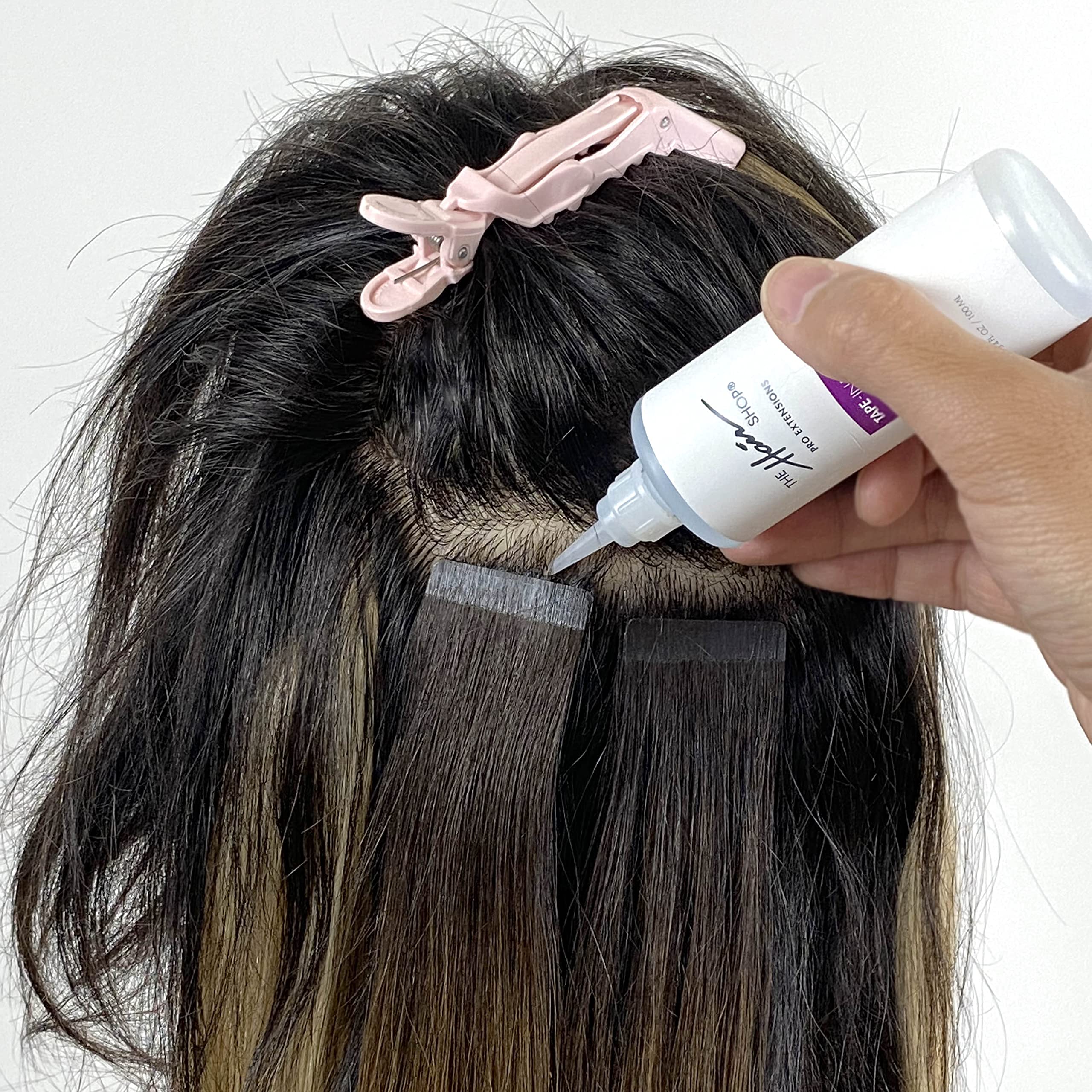 The Hair Shop X10 Pro-Tools in-use shot shows quick, professional tape removal.